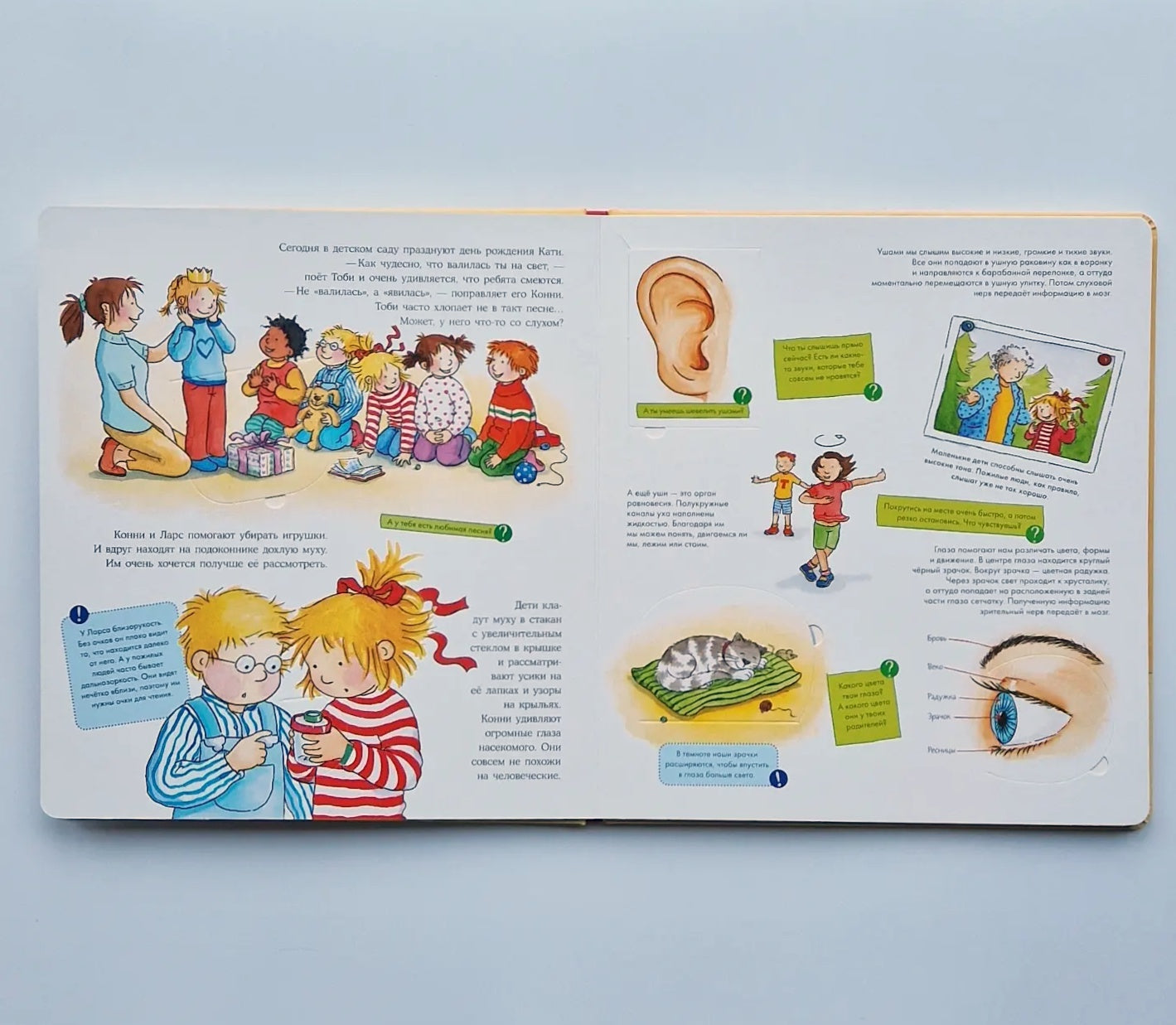 Connie studies the body. Book with windows